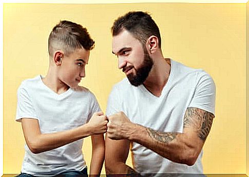 Father and son punch to fist