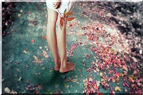 girl-feet-and-flowers-on-the-ground