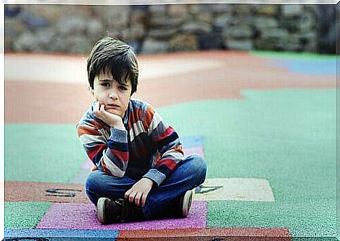 Child sitting on the ground