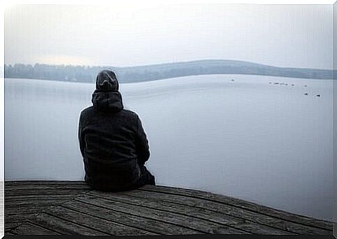 Man sitting on the jetty